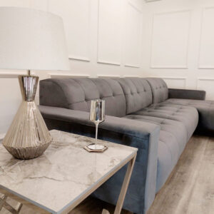 Oslo three piece cinema sofa in steel grey in a room setting with a marble coffee table