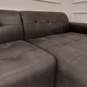 Close view of the Oslo dark suede upholstery