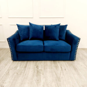 Lincoln two seater sofa in marine blue velvet with scatter back cushions