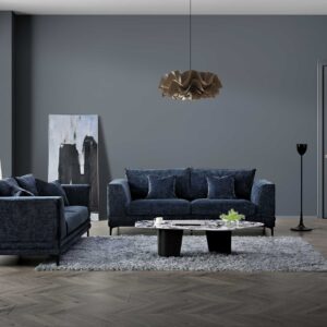 Lenox three and two seater sofas in aegean blue velvet styled in a grey living room with rug and coffee table