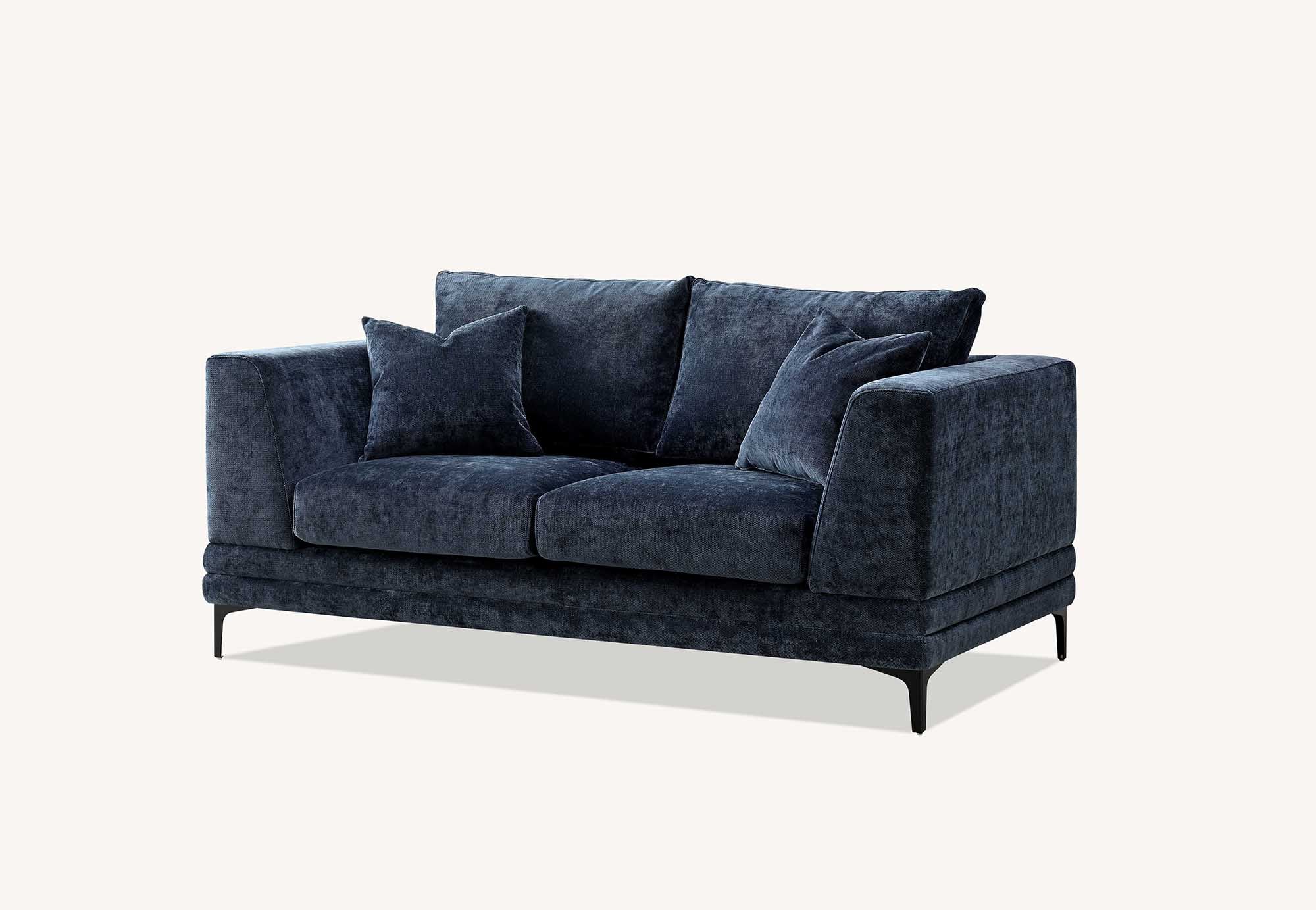 Lenox two seater sofa in aegean blue velvet shown front on against a plain background