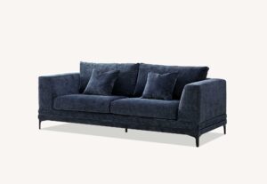 Lenox three seater sofa in aegean blue velvet at a three quarter angle