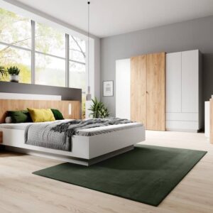 Stockholm 230cm wardrobe in white and Oak Gold Craft in a bedroom with the matching floating bed and chest