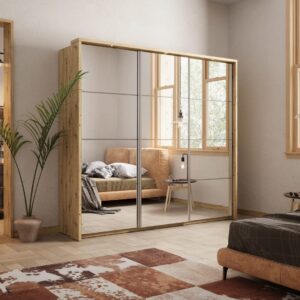 Arti 27 - 3 Sliding Door Wardrobe 240cm in Oak Shetland - shown in a bedroom setting, 240cm wide