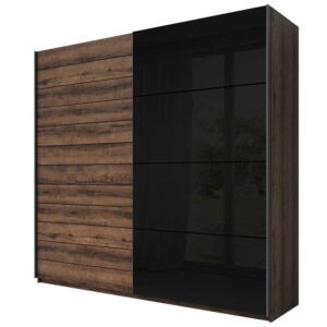 Galaxy Sliding Door Wardrobe in Oak Monastery - shown in a bedroom setting, 270cm wide
