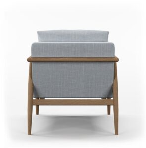 Back view of the Alfie chair showing the upholstered back and ash frame rails