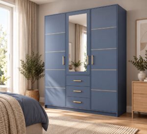 Bali II 3 door wardrobe in Dull Blue with gold strips in a bedroom beside a plant