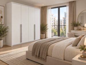 Genua 4 door wardrobe in White Matt in a light bedroom