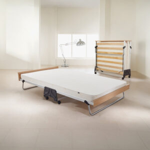 Jay-Be J-Bed small double folding bed opened out in a bright room, with the folded bed behind