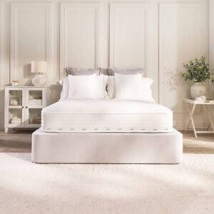 Front view of the Jay-Be Pure Anti-Allergy mattress on a bed base with white pillows