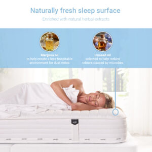 Woman asleep on the Pure Anti-Allergy mattress with margosa and linseed oil call-outs