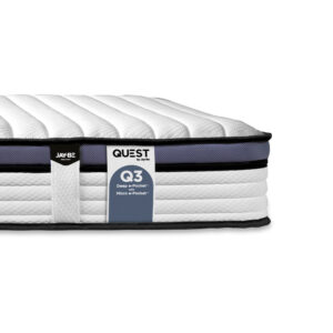 Jay-Be Quest Q3 single children's mattress, side view showing the quilted top and Quest label