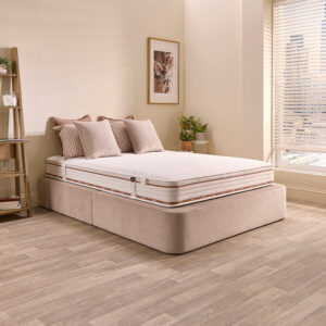 Jay-Be Ryze 800 pocket sprung mattress on a beige upholstered divan in a bright bedroom