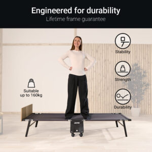 Woman standing on the Tourist frame to show its 160 kg rating and lifetime frame guarantee