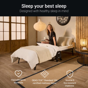 Guest sitting on a made-up Tourist folding bed; hypoallergenic, OEKO-TEX Standard 100 and Source 5 fire-resistant