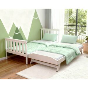 White single bed with the trundle raised on its fold-down legs beside the main bed
