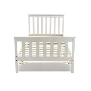 End view of the white wooden single bed showing the footboard and the trundle beneath