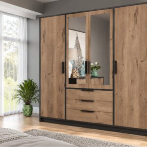 Lati 4 door wardrobe in Oak Viking and black with two mirrored centre doors and three drawers in a bedroom