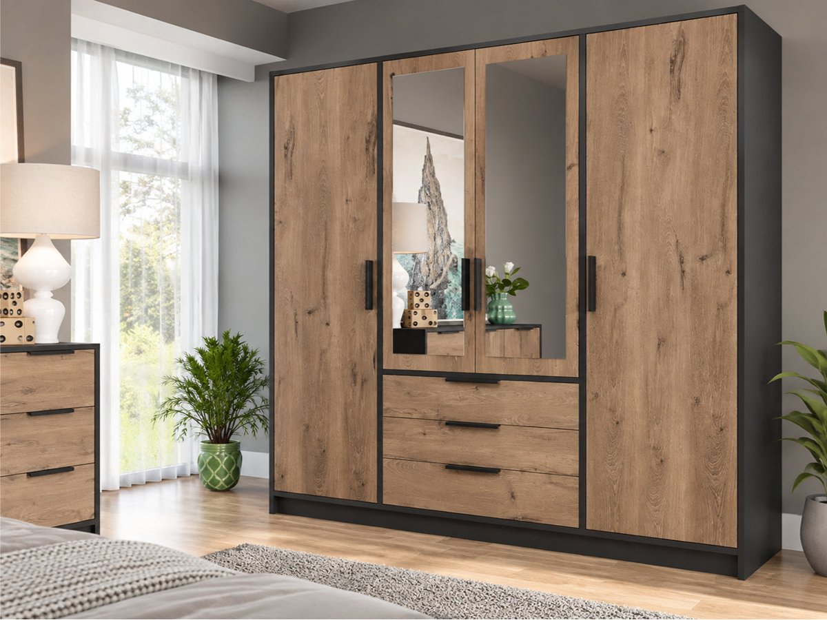 Lati 4 door wardrobe in Oak Viking and black with two mirrored centre doors and three drawers in a bedroom