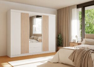 Mallorca 250cm wardrobe in White Matt with mirrored centre doors and oak-effect slatted panels in a bedroom