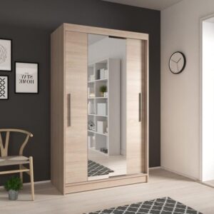Neomi 01 Sliding Door Wardrobe 120cm in Sonoma Oak - shown in a bedroom setting, 120cm wide