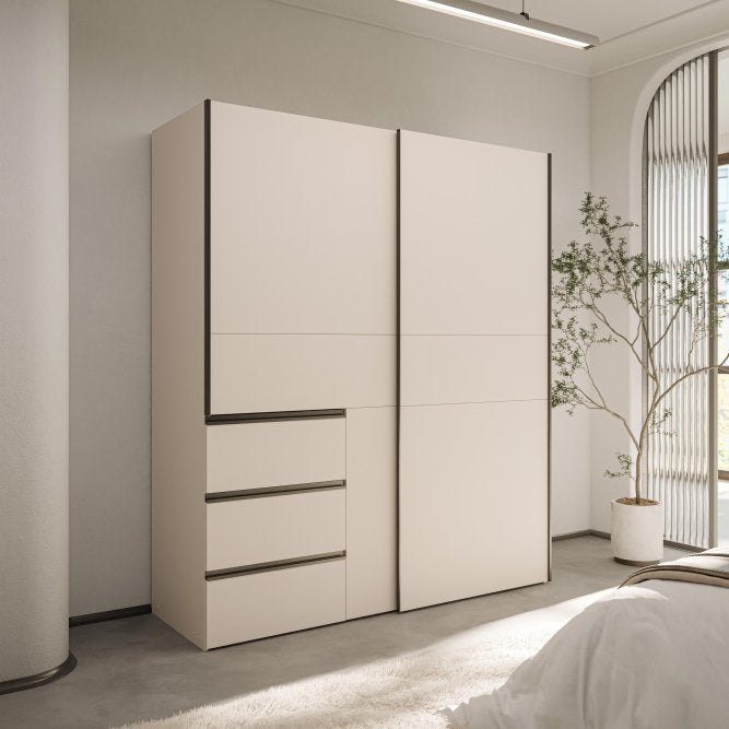 Winn II 170cm sliding wardrobe in Sand with dark handles in a bedroom