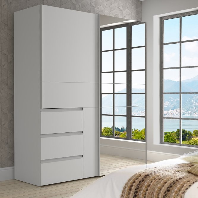 Winn II 170cm mirrored sliding wardrobe in White with three front drawers in a bright bedroom